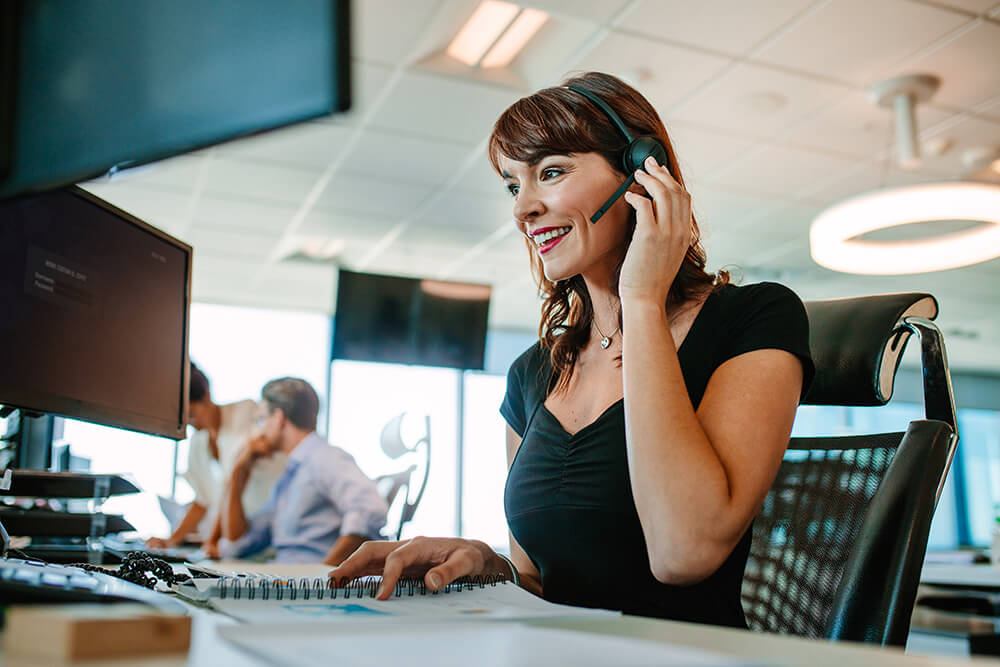 woman excited about modernizing your call center