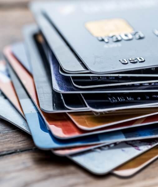 credit union technologies - stack of credit cards