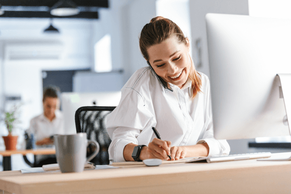 businesswoman on phone trying to increase loan application conversions